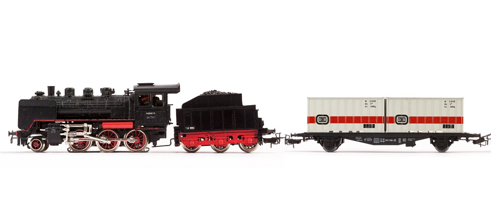 A model of an old-fashioned steam locomotive running on coal A model of an old-fashioned steam locomotive running on coal