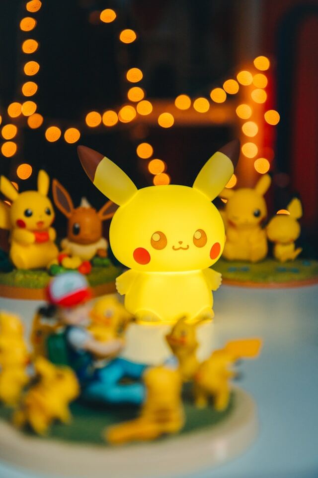 A collection of Pikachu and Eevee anime figures
