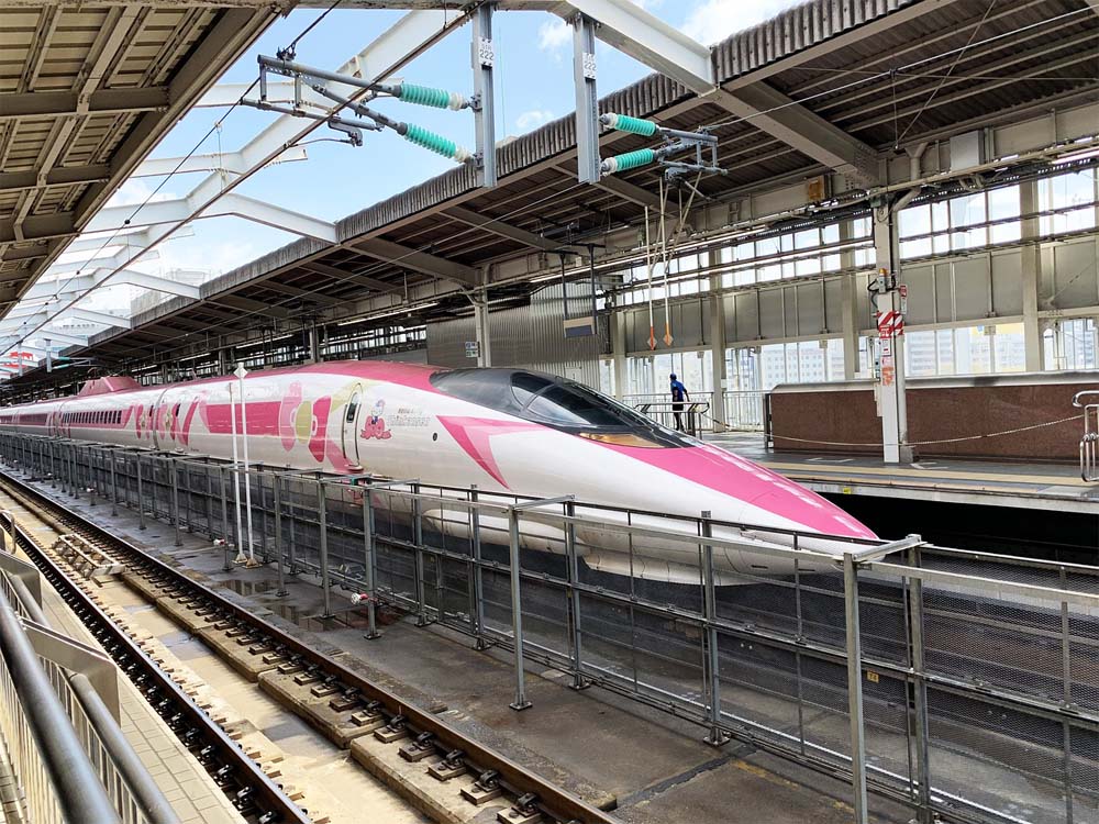 Sakura bullet train at a Japanese railroad station Sakura bullet train at a Japanese railroad station